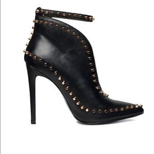 Handmade leather shoes with gold studs